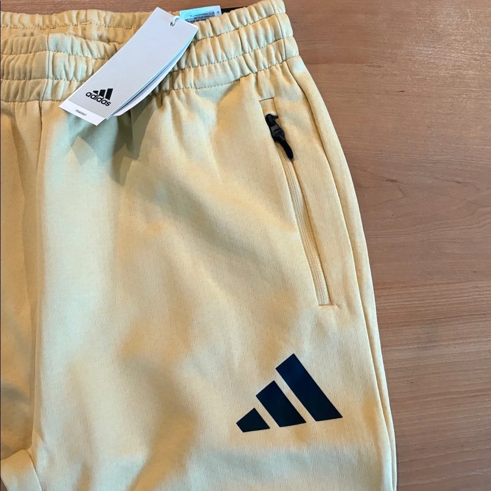 Adidas ZNE boys size XL cream black Sweatpants Prime knit zip jogger Pockets $70